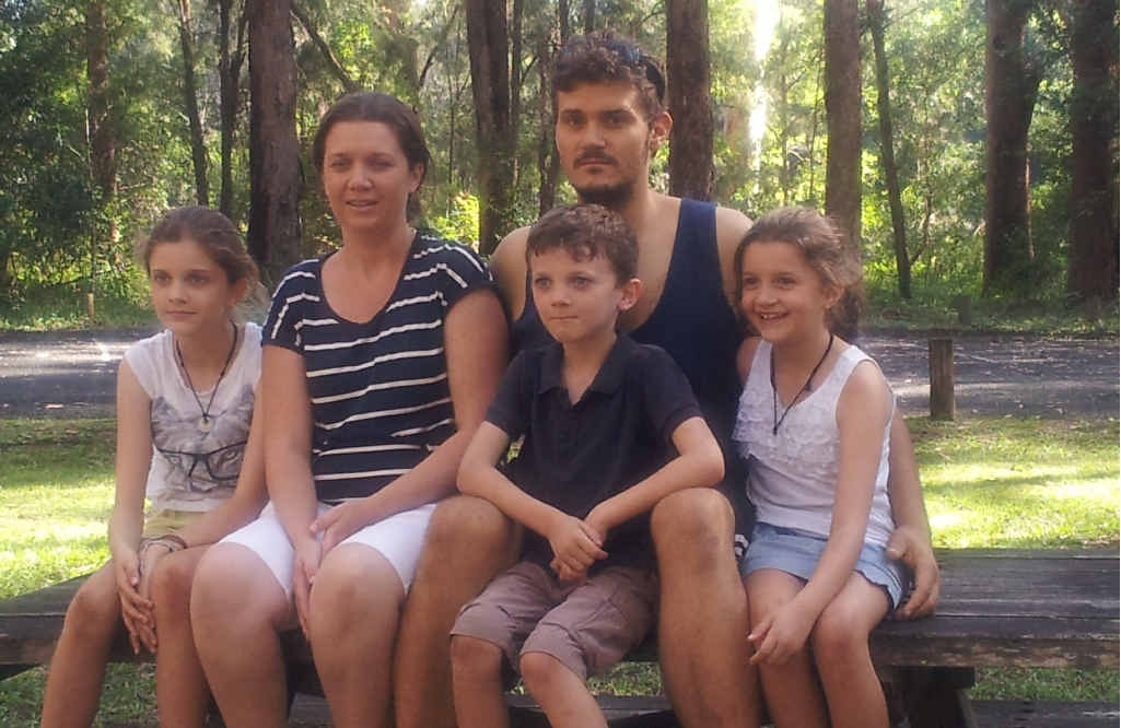 SUPPORT FOR FAMILY: Justin Reynolds with his wife Sueann and children Caitlin, Alexi and Taj. SUPPORT FOR FAMILY: Justin Reynolds with his wife Sueann and children Caitlin, Alexi and Taj.